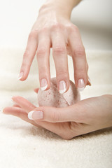 Healthy hands with perfect french nail manicure with soap