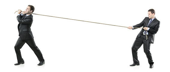 Two businessmen pulling a rope © Ljupco Smokovski