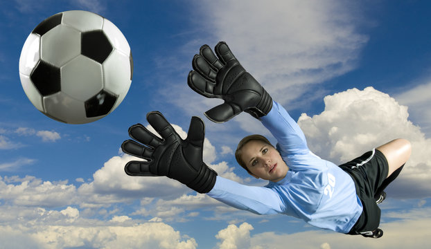 Soccer Goalie Jumping For Ball