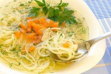 Chicken soup with spaghetti
