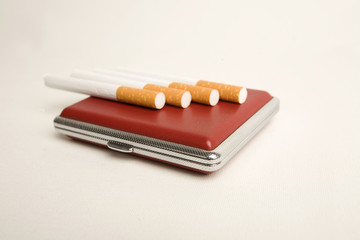 Cigarette with metal box