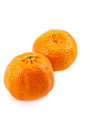 Two mandarine on the white