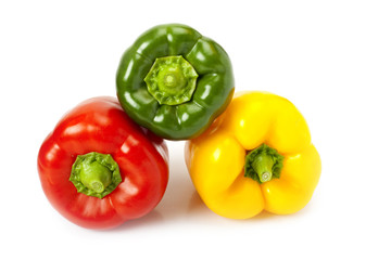 colored peppers on white background