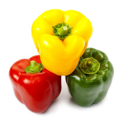 Three sweet peppers in yellow, red and green