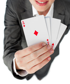 Close-up of a businesswoman holding all the aces