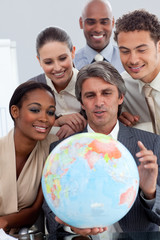 Visionary business people smiling at global business expansion