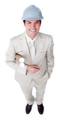 Confident male architect holding blueprints