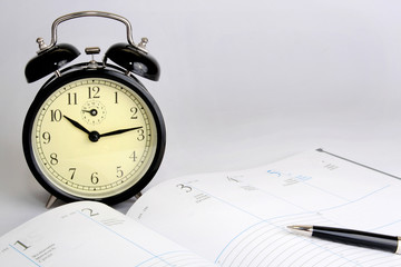open calendar and alarm clock