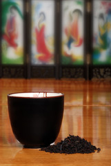 Asian Tea Cup With Herb Leaves