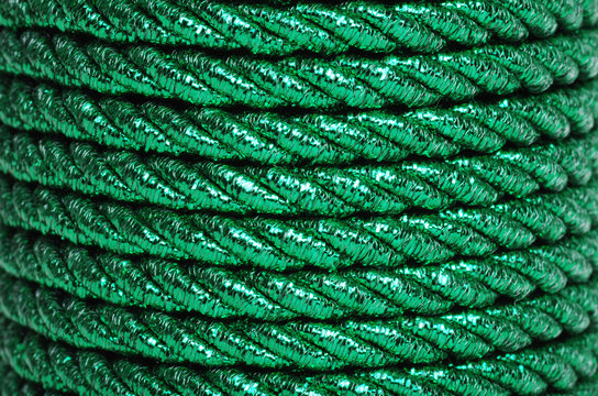Green Foil Cord Making A Background