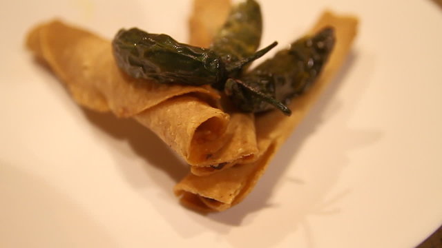 Beef Taquitos with Chili Garnish