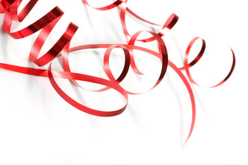 Fototapeta premium Red ribbon on white background.