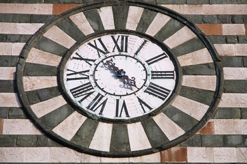 Old clock in Prato, Tuscany