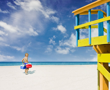 Young Child Going To The Tropical Beach In Miami Florida