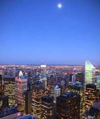 Obraz premium Moon over Manhattan