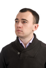 Close-up portrait of a young serious man