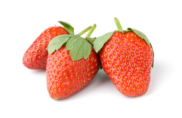 strawberries over white background