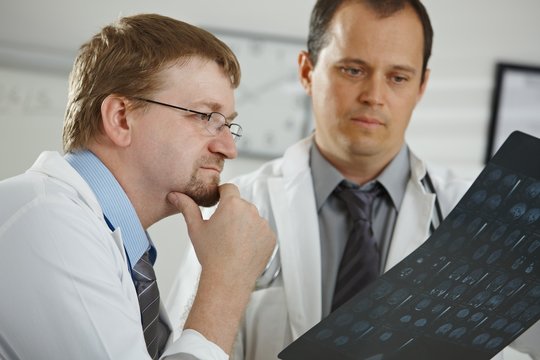 Doctors consluting diagnosis