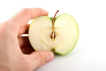 Hulf apple in hand