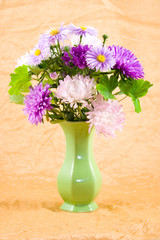 Bouquet in a green vase