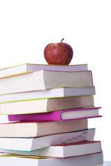 Books and a fresh apple