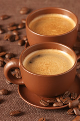 Cups of coffee and beans