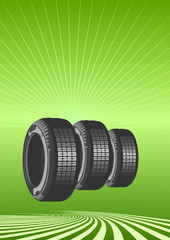 Brand new tires on a green background