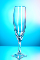 Wine glasses against colourful background