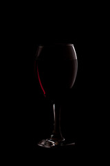 red wine on black background