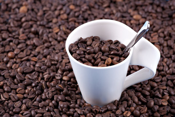 Coffee beans and cup