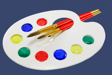Artist's  palette and brushes