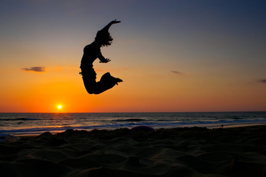 sunset jumping girl