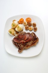 organic pork chop with potato and mushroom
