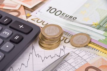 Money,pen, graph and calculator