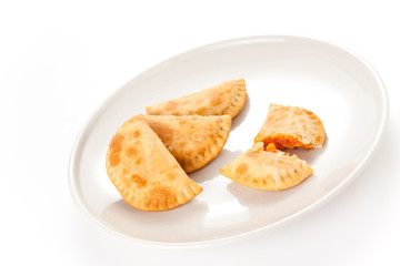 tasty tuna patty with tomato and pepper