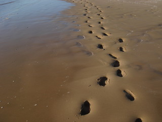 Pied dans le sable