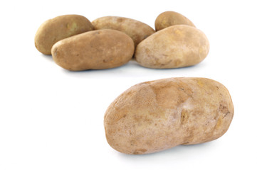 Fototapeta na wymiar Six Raw Russet Potatoes