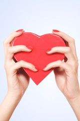 Fototapeta premium Red heart in the hand