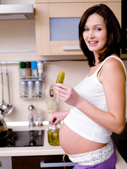 pregnant woman eats the pickles