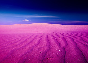 Fototapeta na wymiar Desert dreams and purple sand