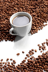 Cup with coffee, costing on coffee grain