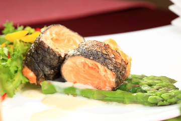 Rosemary roasted salmon served with asparagus