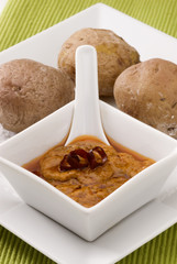 Spanish cuisine. Mojo picon and papas arrugas. Red mojo sauce.