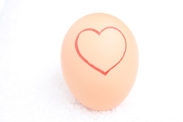 Red heart on egg