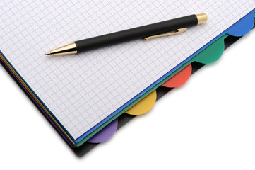 Fototapeta na wymiar Notebook - organizer with the stylish pen.Color bookmarks