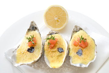 oysters with sauce and lemon