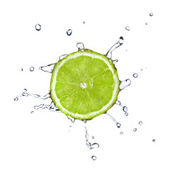 Slice of lime with water drops isolated on white