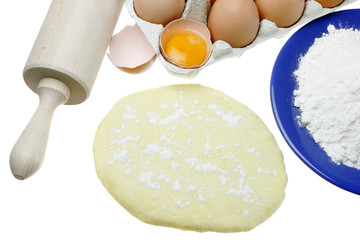 Eggs,dough and rolling pin.