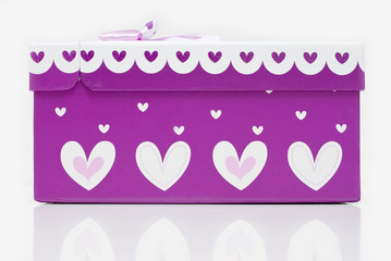 beautiful hand-made purple gift box in white background