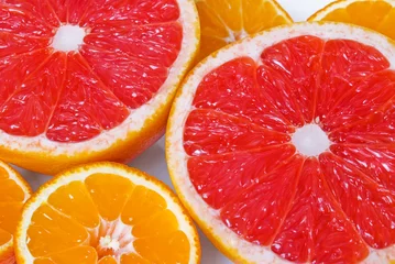 Crédence de cuisine en plexiglas Tranches de fruits Pamplemousses roses et mandarines